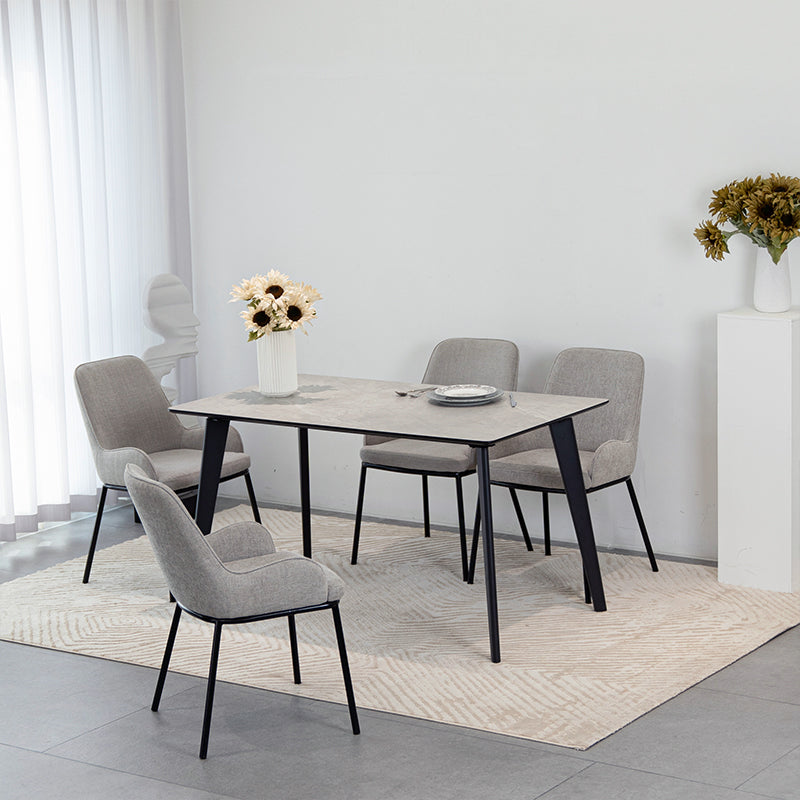 Mesa de comedor rectangular Valdez de 140cm con tablero de melamina efecto mármol gris y estructura de metal negro mate