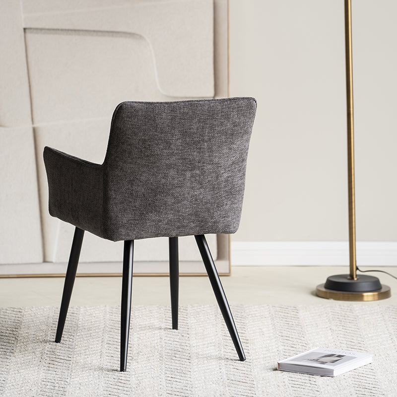 Sillón comedor en lino gris oscuro con patas de madera oscura, perfecto para estilos industrial o nórdico