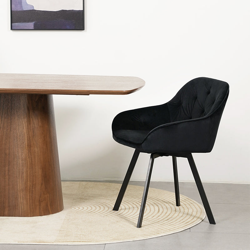Versión en color gris oscuro de la silla de comedor giratoria Keaton, combinando con muebles de estilo industrial