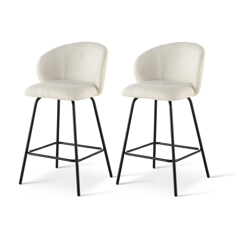 Taburete giratorio Yasin UDC23121 en tejido bouclé, altura 65 cm, ideal para islas de cocina o bares. Respaldo acolchado y estructura metálica resistente.