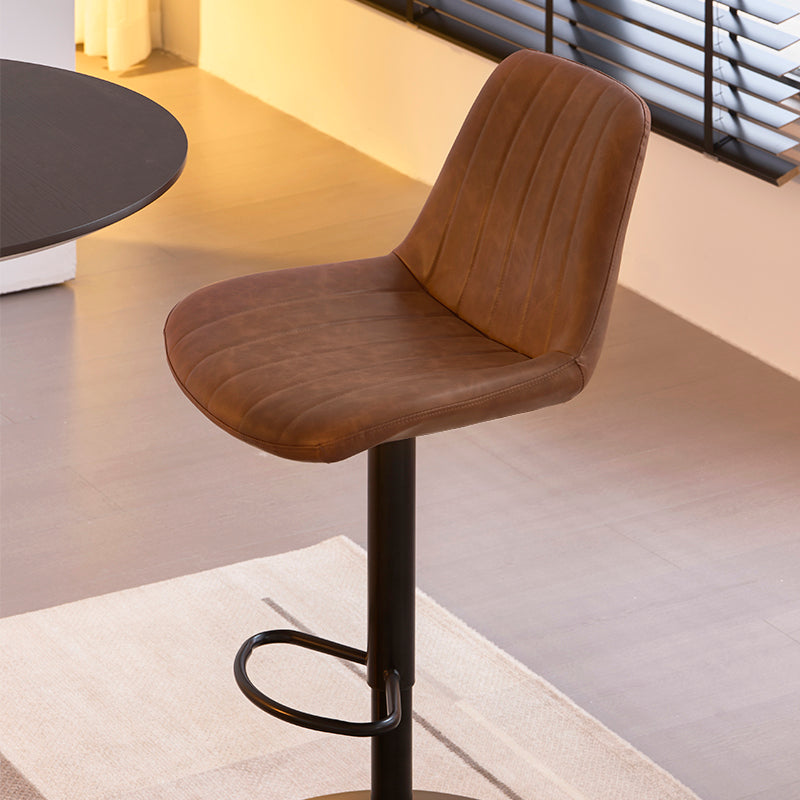 Taburete de barra Jarvis AJ en PU negro, altura regulable 62-82 cm con mecanismo hidráulico y giro 360°